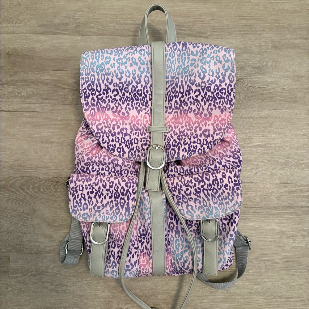 Backpack cute animal print in shades of pink and purple